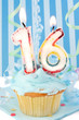 teenagers sixteenth  birthday cupcake with blue frosting