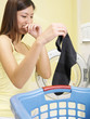 woman in front of washing machine