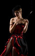 Attractive cabaret girl smoking a sigarette with an extension Attractive cabaret girl smoking a sigarette with an extension