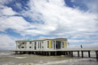 Photo: Lifeguard station,Lifeguard man watching the sea in Italy Lifeguard station,Lifeguard man watching the sea in Italy