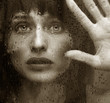 Beautiful Woman caught on the outside in The Rain