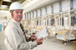 Inpector performing an audit of a factory.