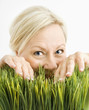 Mischievious woman in grass
