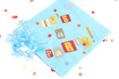 cut out letters spelling it's a party on baby blue napkins