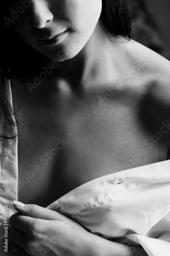 Photo: Young adult Caucasian woman in a white shirt and lingerie Young adult Caucasian woman in a white shirt and lingerie