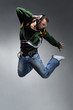 Foto: cool looking dancer makes a difficult jump cool looking dancer makes a difficult jump