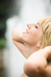 Profile of fresh woman with closed eyes and happy smile