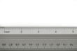 School metal ruler on white background