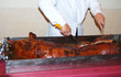 Découpe d'un cochon farci Découpe d'un cochon farci