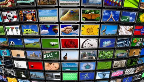 Illustration: Big installation of Flat Panel TVs displaying different images Big installation of Flat Panel TVs displaying different images