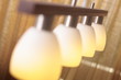 Close up of a lit kitchen lamp