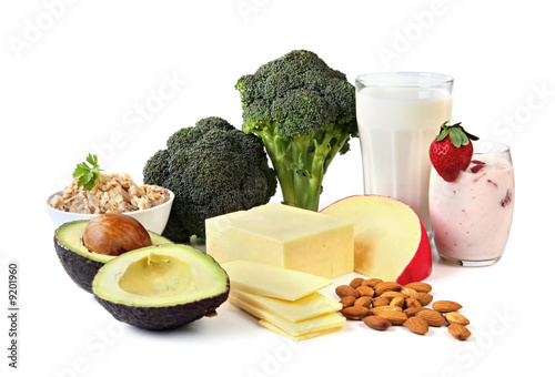 Photo: Food sources of calcium, isolated on white. Food sources of calcium, isolated on white.