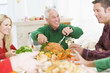 Family All Together At Christmas Dinner