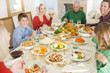 Family All Together At Christmas Dinner