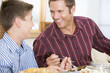 Father And Son At Christmas Dinner