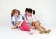 adorable school girls on white background