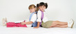 pretty school girls posing over white
