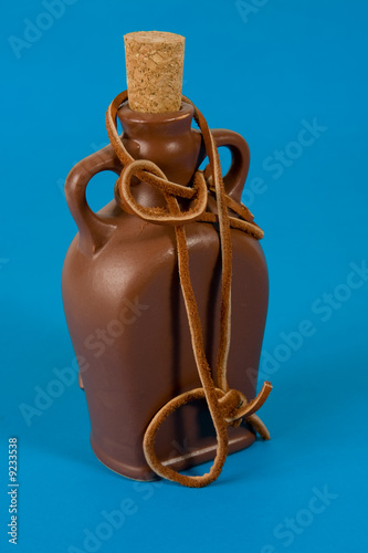 Foto: Pottery bottle with a cork Pottery bottle with a cork