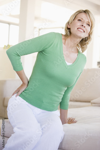 Foto: Woman With Back Pain Woman With Back Pain
