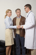 Doctor shaking hands with a patient