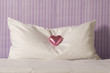 Chocolate on hotel room pillow, close-up