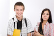 happy schoolboy and girl on white background