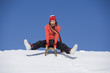 Young woman riding sledge