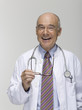 Senior male doctor laughing, portrait