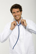 Male doctor smiling, close-up, portrait