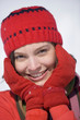 Woman wearing cap and gloves, portrait