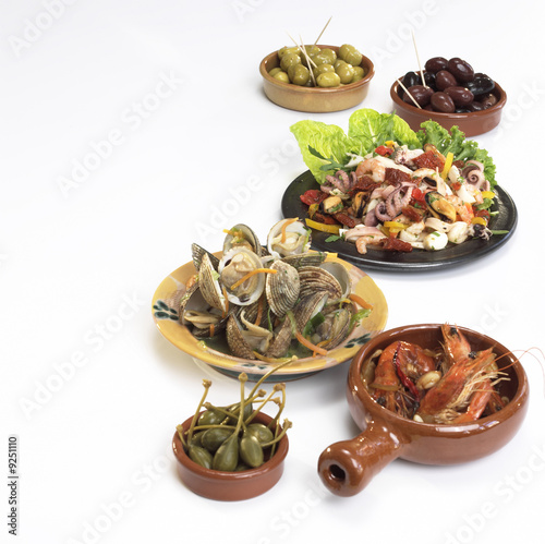 Photo: Mediterranean starters, olives, capers and sea food Mediterranean starters, olives, capers and sea food