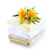 Stack of soft towels isolated on white background
