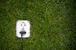 Photo: energy consept outllet in grass with a slight vignet energy consept outllet in grass with a slight vignet