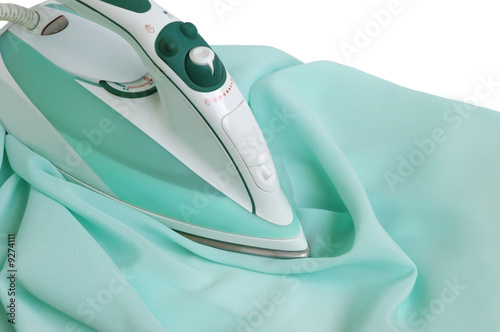 Ironing a piece of satin clothing