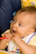 Little baby sitting comfort and eating.