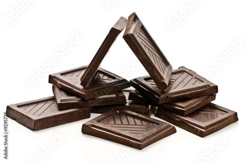 Chocolate pieces arranged like home isolated on white