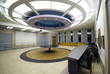 Photo: empty hall with round table and armchairs empty hall with round table and armchairs