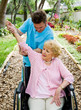 Senior woman with arthritis receives physical therapy