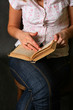 Female hands with the old book Female hands with the old book