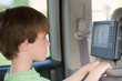 Foto: Boy Watching Movie in Van Boy Watching Movie in Van