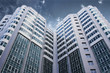 Modern glass business center with dramatic sky Modern glass business center with dramatic sky