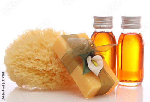 bottles with essential oils and sponge