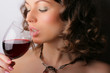 Portrait of beautiful woman with glass red wine