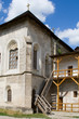 old stone two-storeyed house with a wooden stair