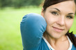 attractive brunette woman in park