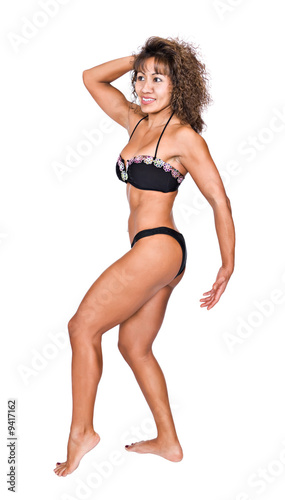 Photo: muscular hispanic female bodybuilder, with a beautiful body muscular hispanic female bodybuilder, with a beautiful body