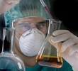 Scientist taking a probe in a labor scene with testtubes