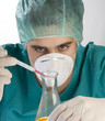 Scientist taking a probe in a labor scene with testtubes