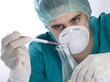 Scientist taking a probe in a labor scene with testtubes