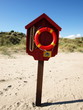 lifebuoy in the sandy beach